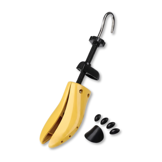 Yellow shoe stretcher with black components on a white background